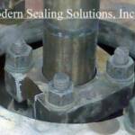 With this common design you have NO way to visualy determine loss of load and thus no opportunity to make adjustments and prevent a packiing failure.